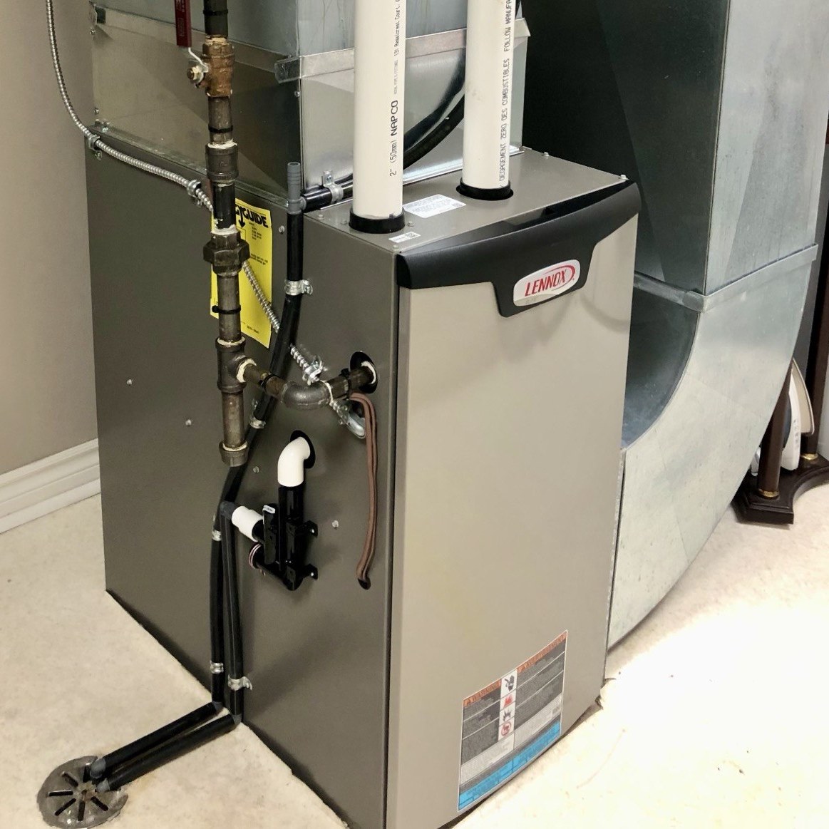 Lennox high-efficiency furnace installed in a Durham Region home by Daly Home Comfort