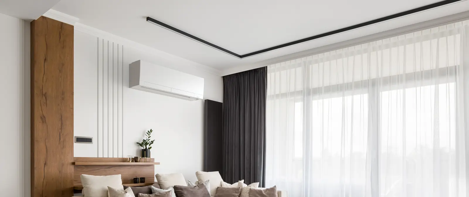 Mitsubishi Electric FX wall-mounted heat pump installed in a living room